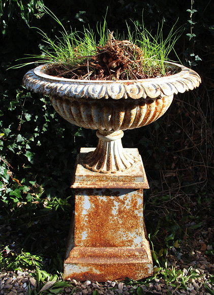 Appraisal: A VICTORIAN CAST IRON PLANTER of shallow campana urn form