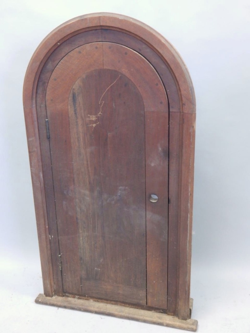 Appraisal: A thC and later country made arched door and surround