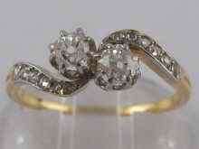 Appraisal: A yellow metal tests carat gold diamond cross over ring