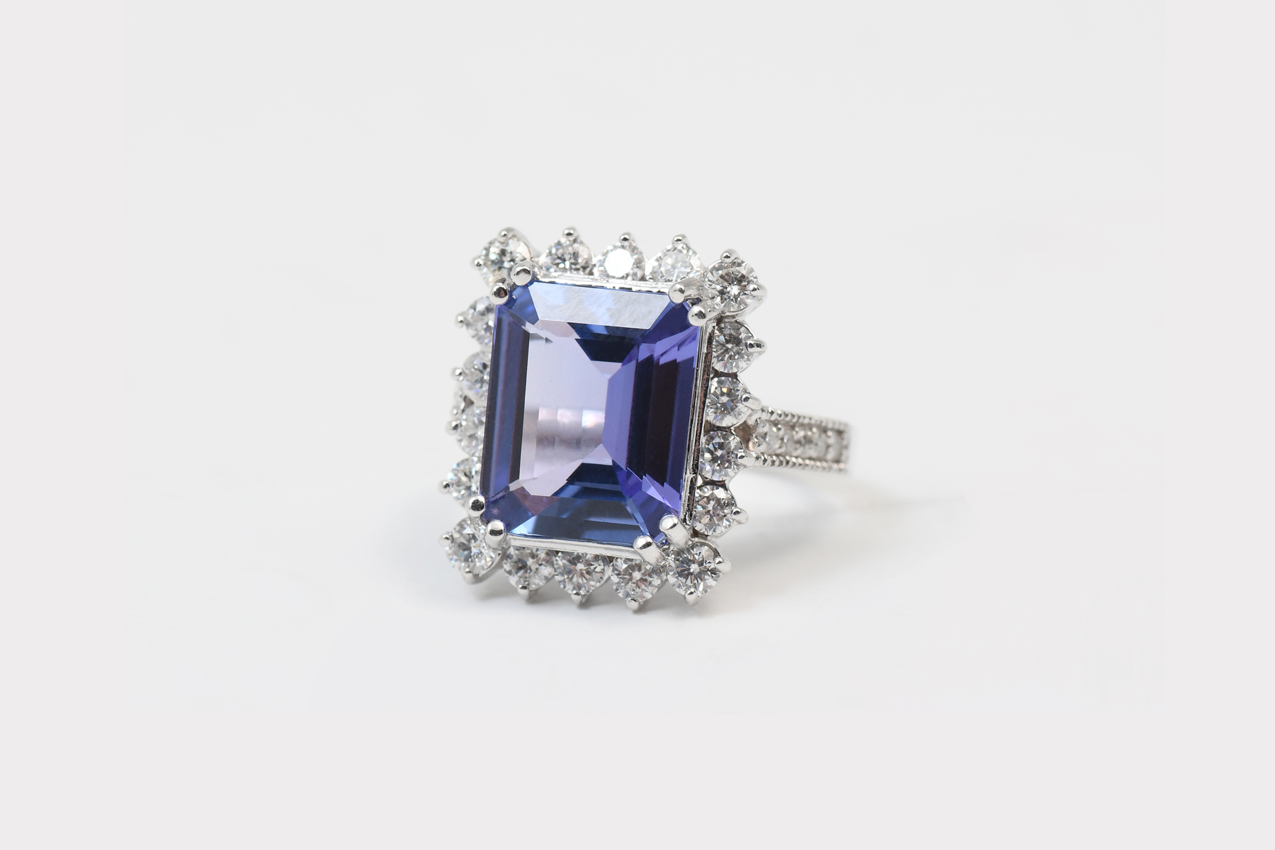 Appraisal: K CT TANZANITE DIAMOND RING CT emerald cut tanzanite is