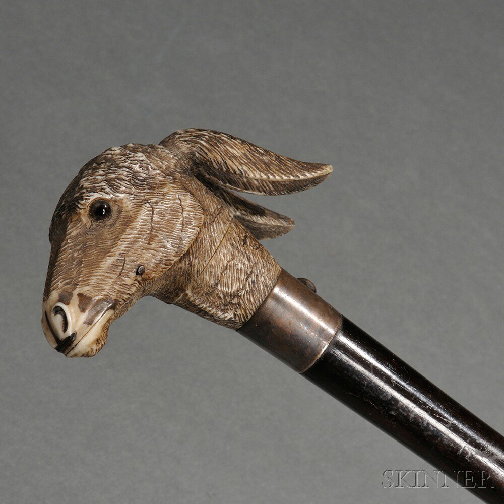 Appraisal: Parasol with Articulated Donkey-carved Handhold late th century the donkey