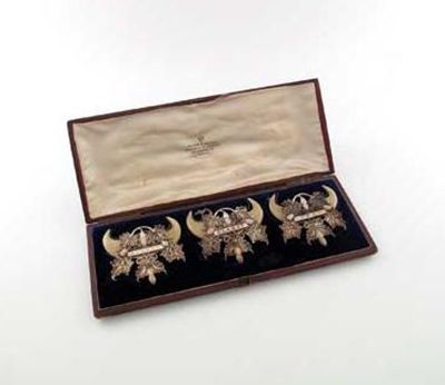 Appraisal: A cased set of three th century mounted tiger claw