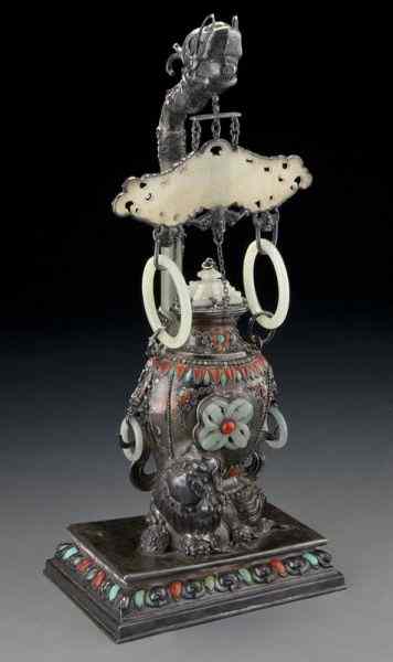 Appraisal: Chinese-Mongolian jade inlaid silver hanging vasestudded with coral and turquoise