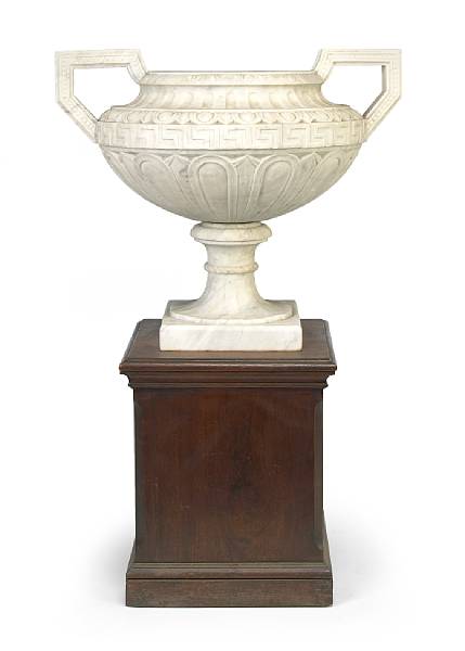 Appraisal: A Neoclassical style carved marble urn The squat circular vessel