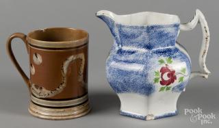 Appraisal: Blue spatter pitcher with Adam's rose decoration '' h together