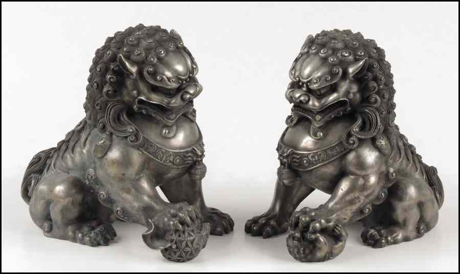 Appraisal: PAIR OF METAL FOO DOGS H '' Condition No Specific