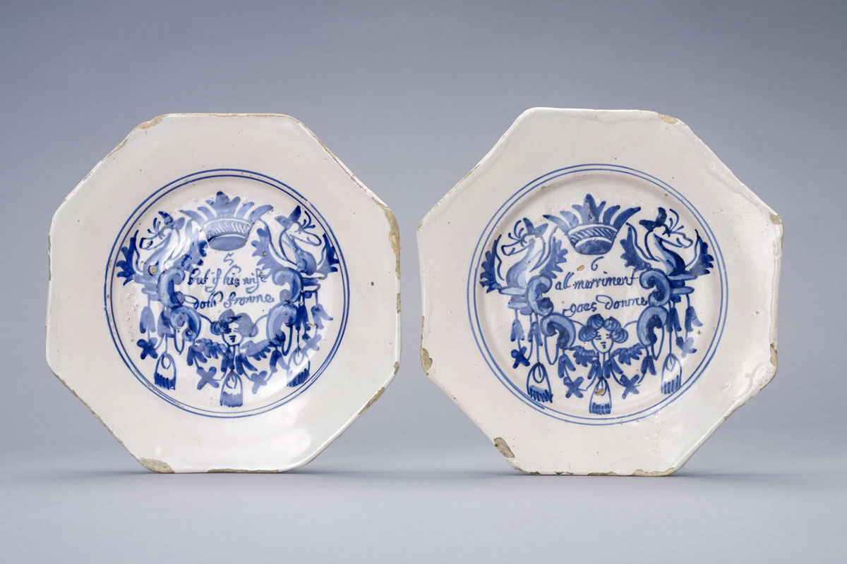 Appraisal: TWO ENGLISH DELFT BLUE AND WHITE 'MERRYMAN' PLATES PROBABLY LONDON