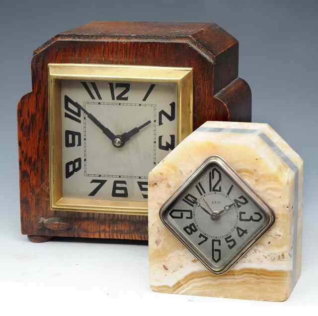 Appraisal: A FRENCH ART DECO ONYX AND GREY MARBLE ALARM CLOCK