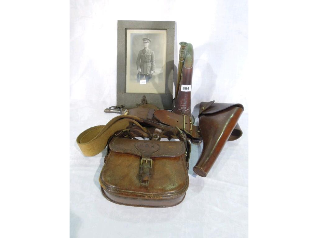 Appraisal: A standard World War I leather belt with holster attachment