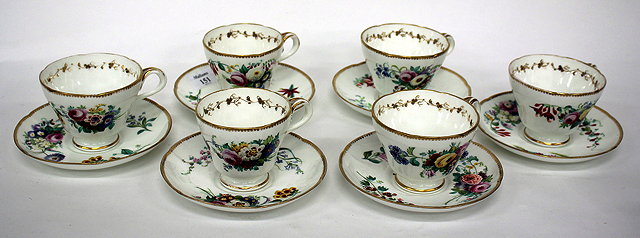 Appraisal: SIX TH CENTURY PORCELAIN CUPS AND SAUCERS each with hand