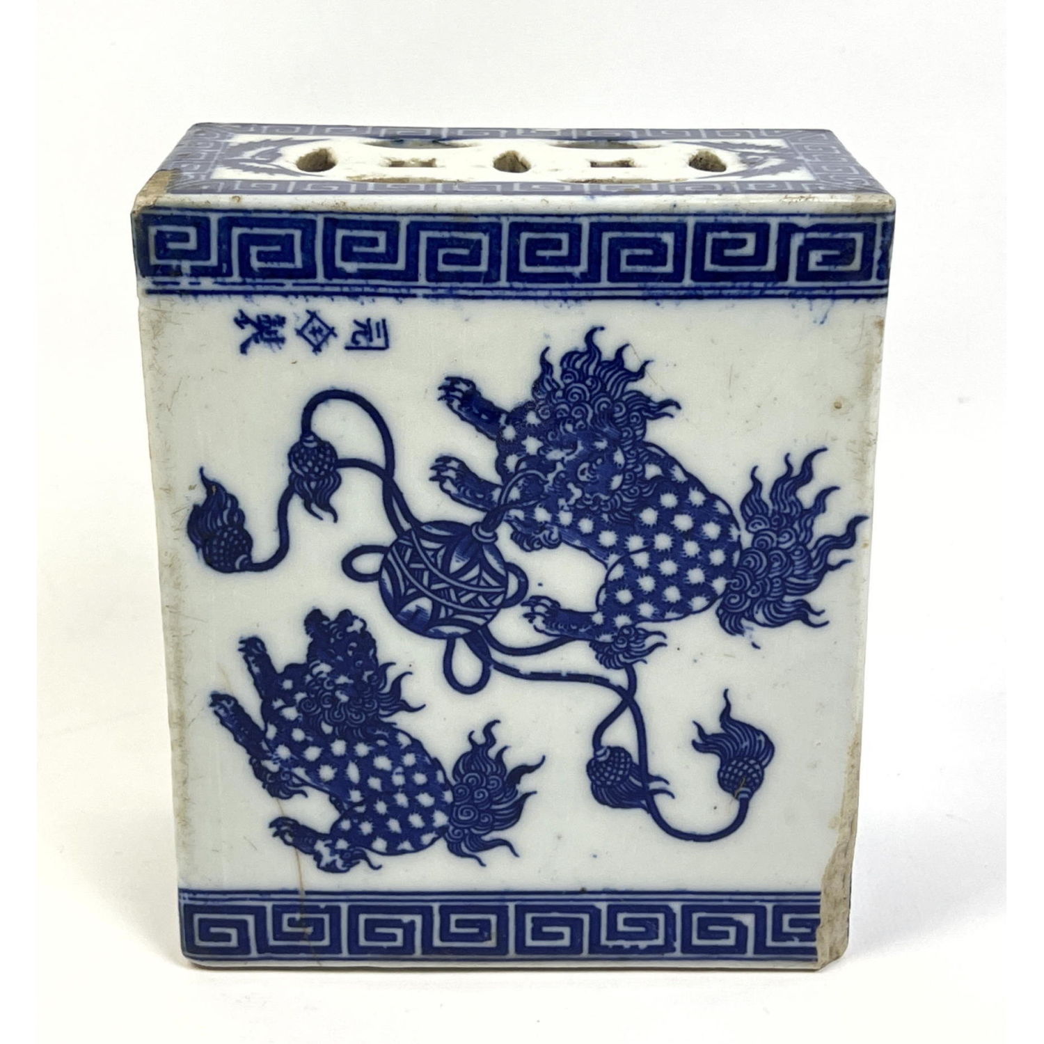 Appraisal: Chinese glazed Pillow with shaped openings to the ends Blue