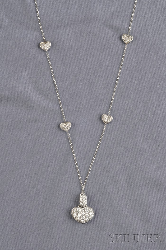 Appraisal: kt White Gold and Diamond Heart Necklace designed as hearts