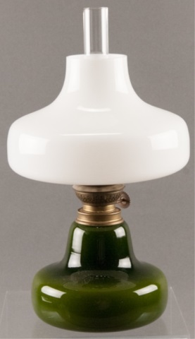 Appraisal: Brenner-Kosmos Oil Lamp Green glass base opaque white shade clear