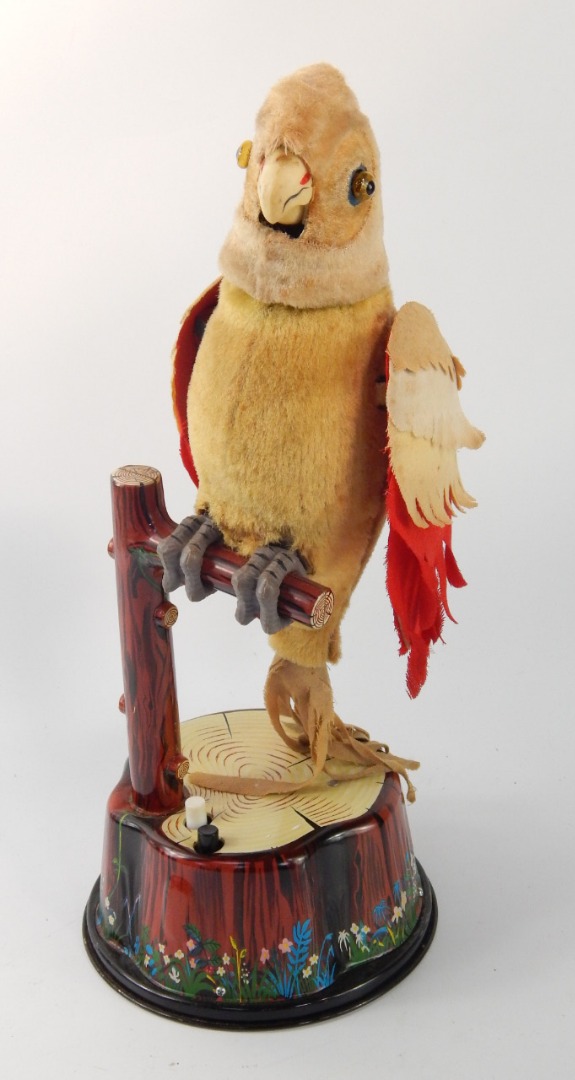 Appraisal: A Louis Marx branded parakeet automaton with a CK Japanese