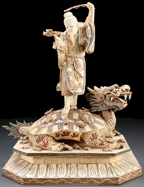 Appraisal: A LARGE AND IMPRESSIVE CARVED BONE FIGURAL GROUP A LARGE