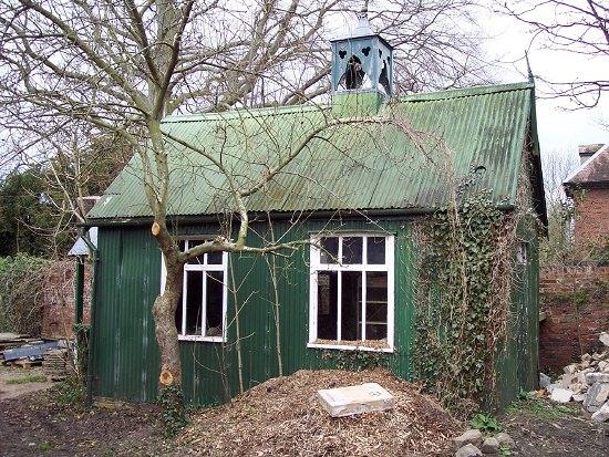 Appraisal: The corrugated iron Chapel with pitched roof above two large