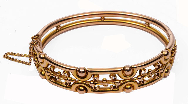 Appraisal: A RENAISSANCE REVIVAL STYLE CT HOLLOW GOLD HINGED BANGLE with