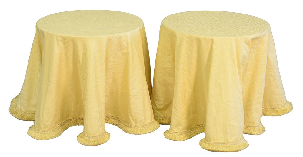 Appraisal: Pair of Round Tables with yellow linen cloth having glass