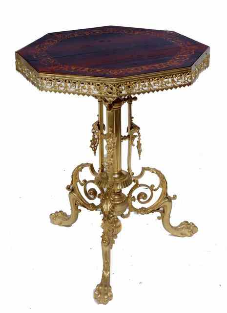 Appraisal: AN ITALIANATE HEXAGONAL OCCASIONAL TABLE with marquetry top and brass