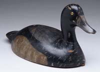 Appraisal: CARVED AND PAINTED DUCK DECOY BRANDED J E PETERKIN The