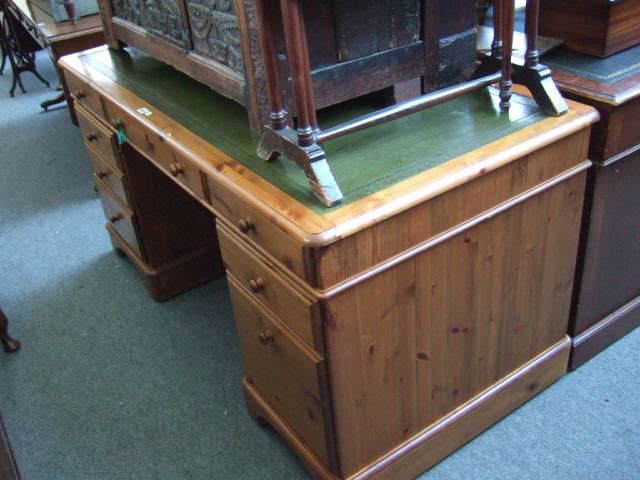 Appraisal: A Ducal pine twin pedestal desk with inset top and