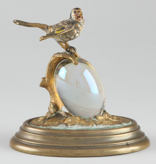 Appraisal: Bird with opalescent sphere in form of egg S