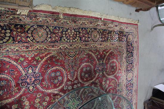 Appraisal: ORIENTAL STYLE RUG Room size rug having a red ground