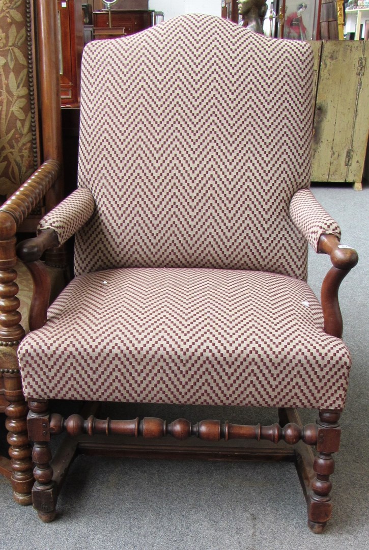 Appraisal: A th century Italian walnut framed open armchair on block