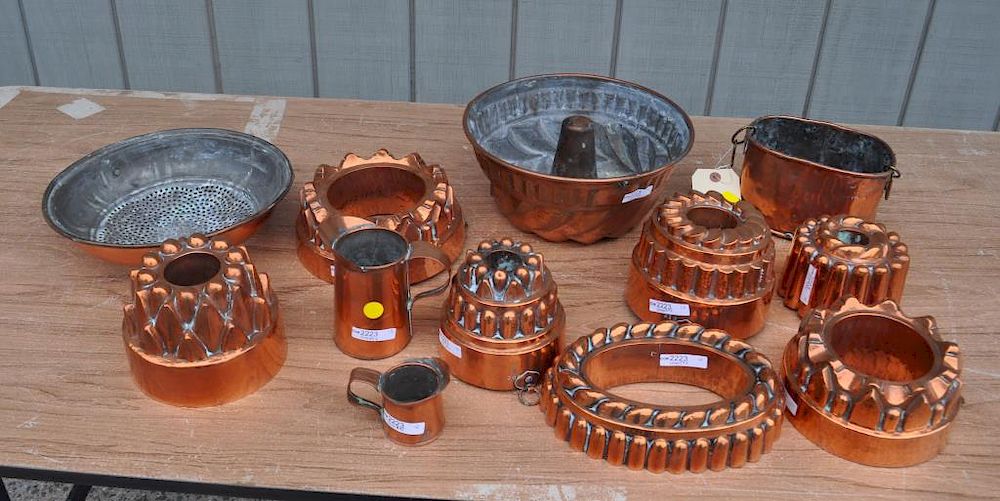 Appraisal: Group Twelve Copper Kitchen Items comprising eight molds strainer two