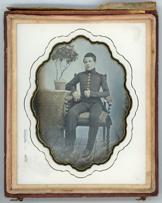 Appraisal: EUROPEAN SOLDIER PLANT DAGUERREOTYPE Young soldier in a Napoleonic pose