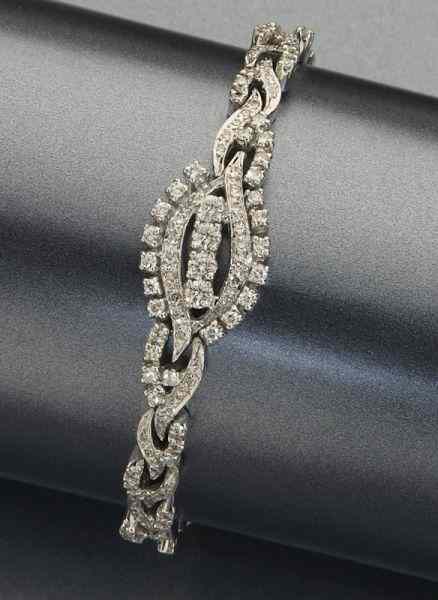 Appraisal: Retro K gold and diamond bracelet having round single cut