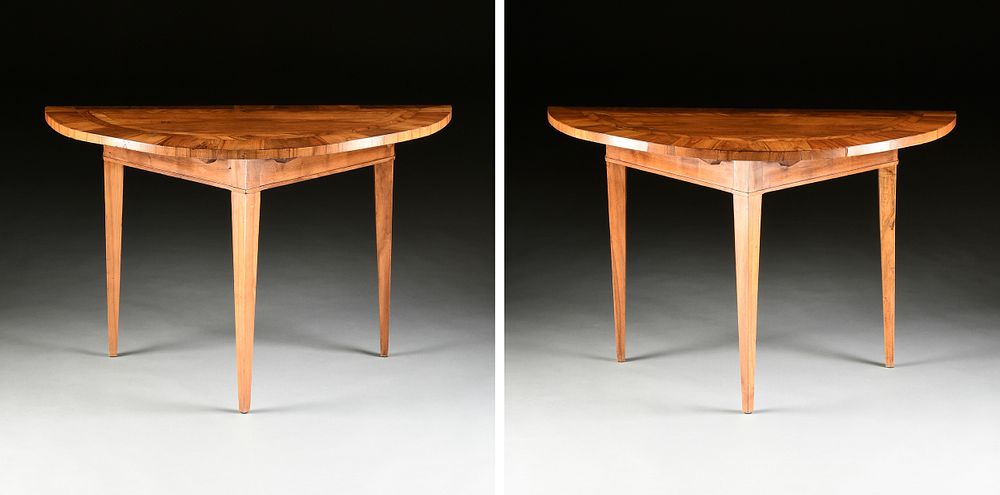 Appraisal: A PAIR OF BIEDERMEIER DEMILUNE CHERRY CONSOLE TABLES POSSIBLY SOUTH