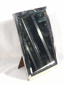 Appraisal: A rectangular English silver wood-backed strut mirror hallmarked Birmingham cm