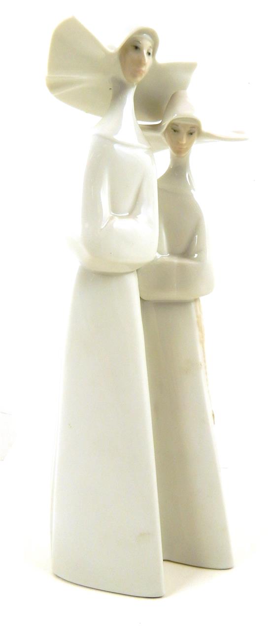 Appraisal: th C Lladro figural group depicting two standing nuns in