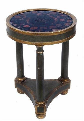 Appraisal: A CONTINENTAL EMPIRE STYLE CIRCULAR SPECIMEN TABLE with brass top