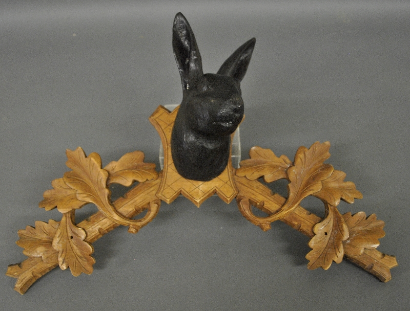 Appraisal: - Black Forest cuckoo clock crown section with carved rabbit