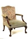 Appraisal: LOLLING CHAIR - Turn of the century mahogany replica of