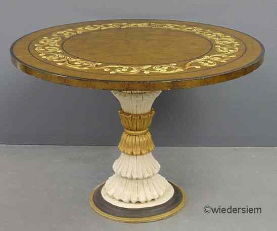 Appraisal: Italian center hall table with a round foliate decorated top