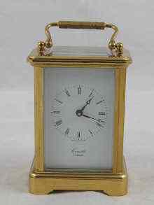 Appraisal: A brass carriage clock by Comitti the backplate marked ''