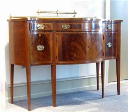 Appraisal: Hepplewhite-style mahogany inlaid sideboard th century Deep serpentine front with