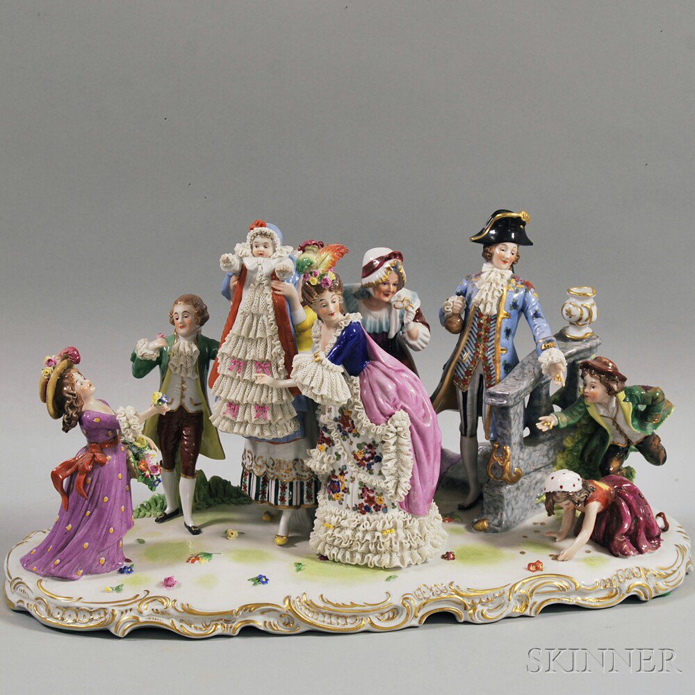 Appraisal: German Porcelain Figural Plateau th century depicting a street scene