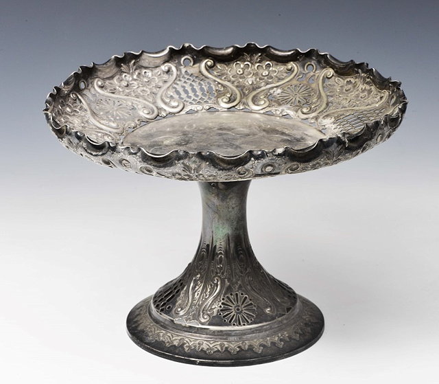 Appraisal: A LATE VICTORIAN SILVER TAZZA with pierced and pressed scroll