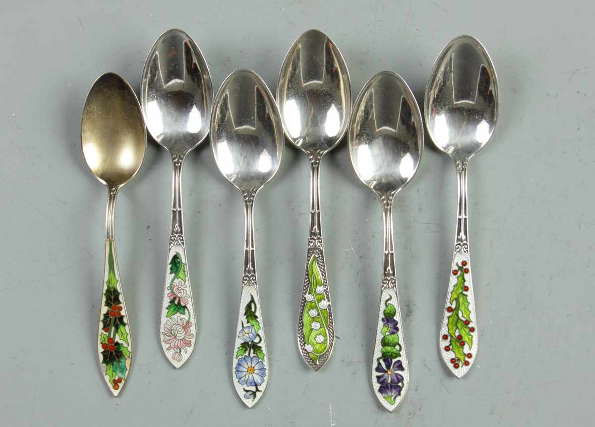 Appraisal: Matching Unmatched Enameled Sterling Teaspoons Matching Unmatched Enameled Sterling Teaspoons