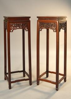 Appraisal: Pair of Chinese carved rosewood tall stands th C Pair