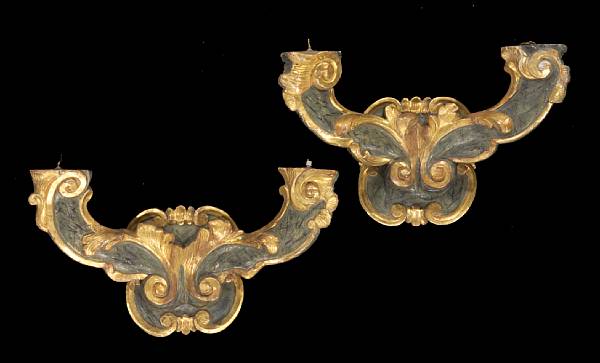 Appraisal: A pair of Italian Baroque faux marbleized and parcel gilt