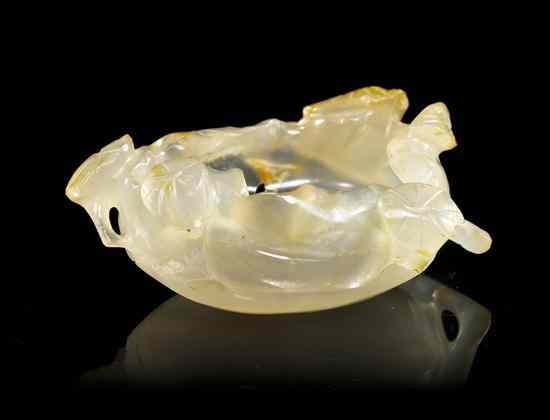 Appraisal: A Chinese Agate Coupe of a translucent pale gold hue