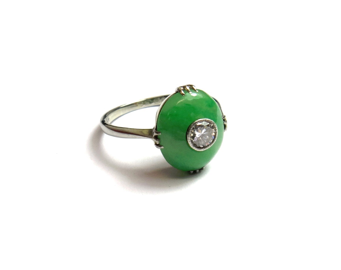 Appraisal: A white gold and platinum diamond and jade set ring