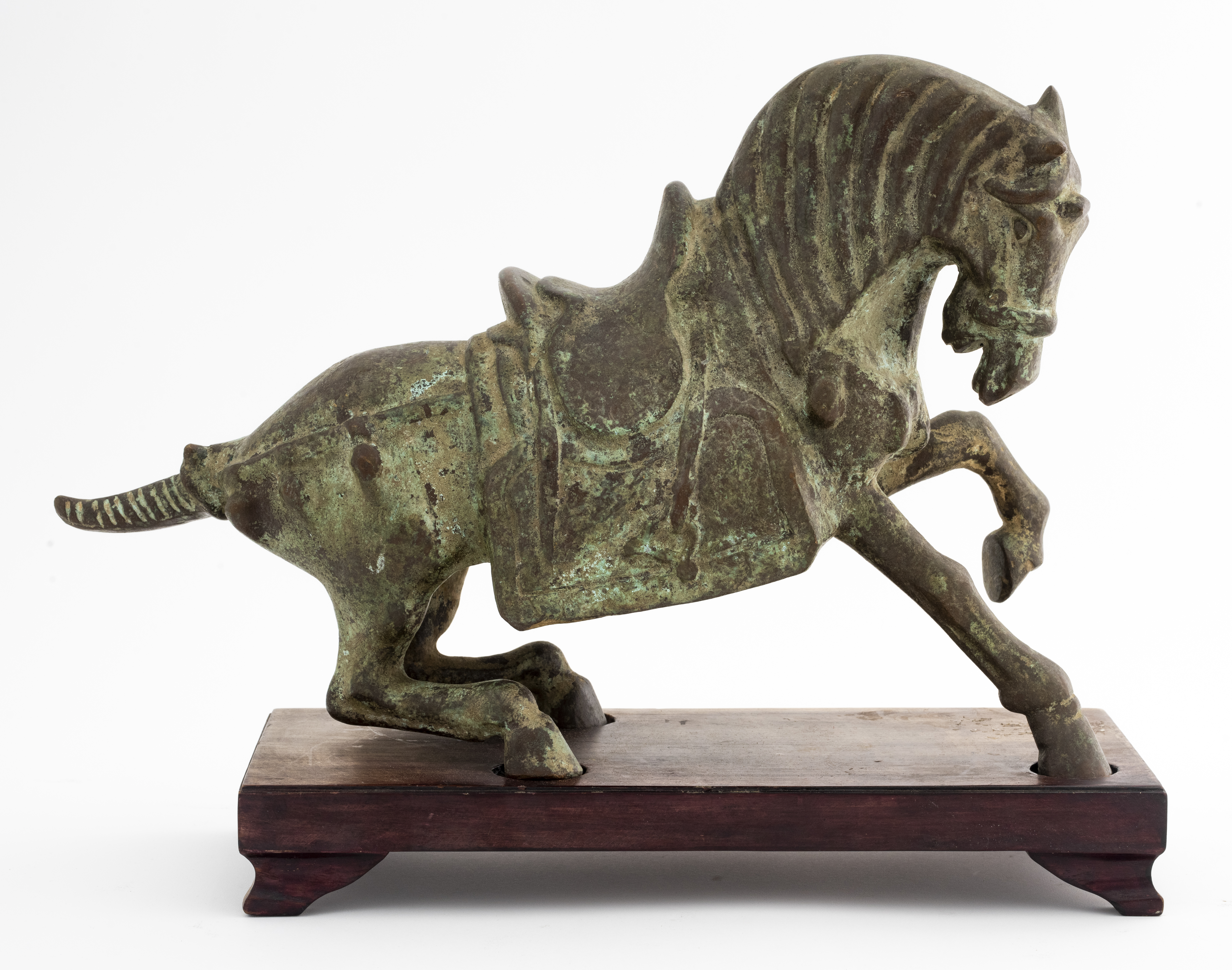 Appraisal: CHINESE ARCHAIC MANNER PATINATED BRONZE HORSE Chinese Archaic manner patinated