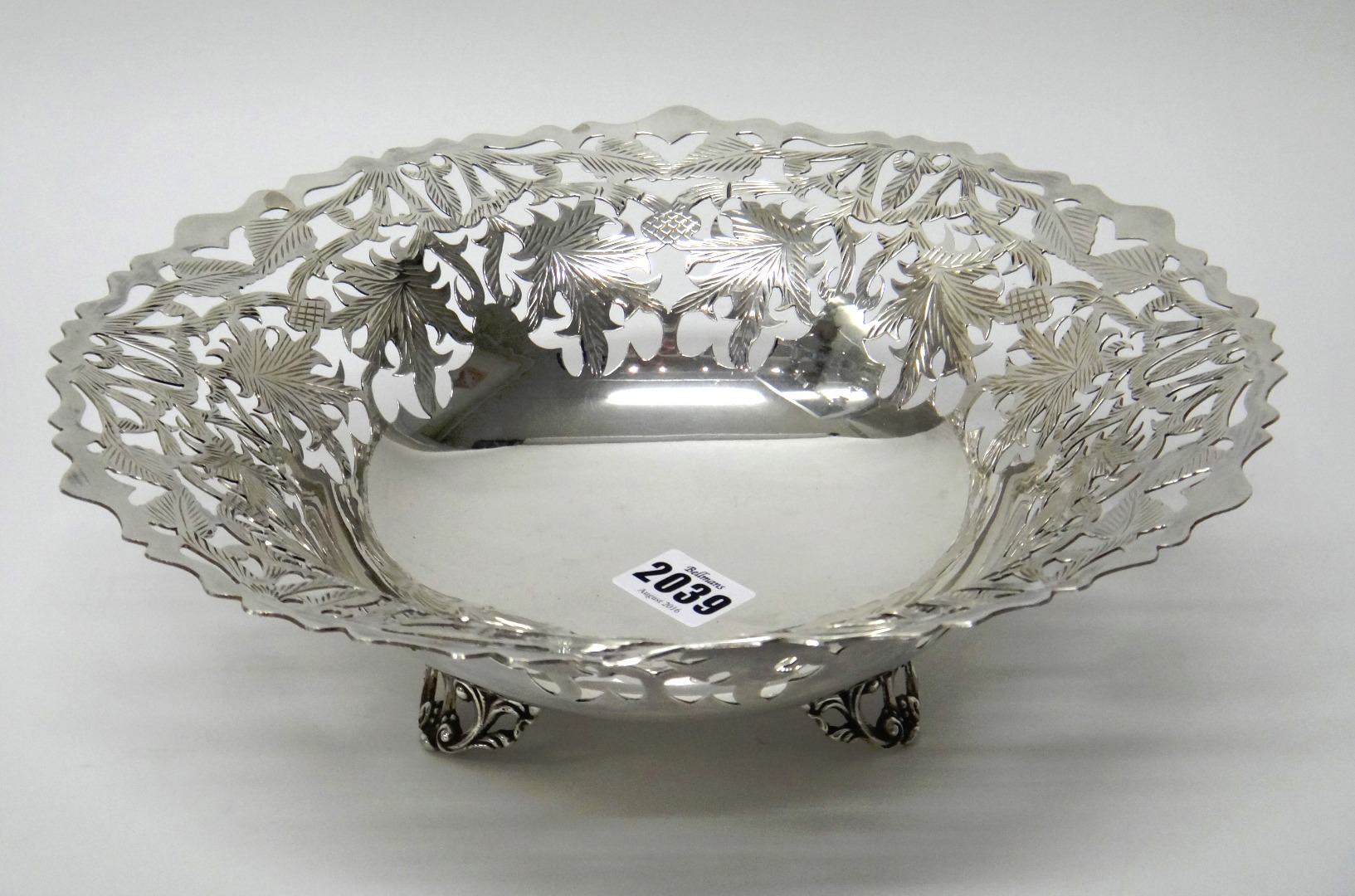 Appraisal: An Egyptian shaped circular bowl having pierced and engraved decoration