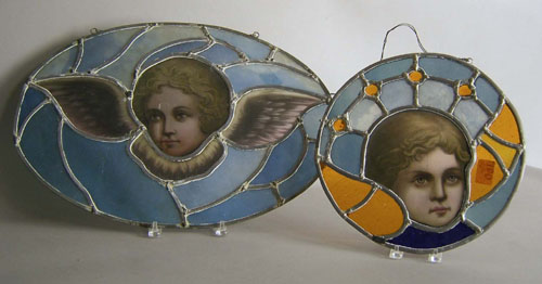 Appraisal: Two leaded glass plaques x and dia